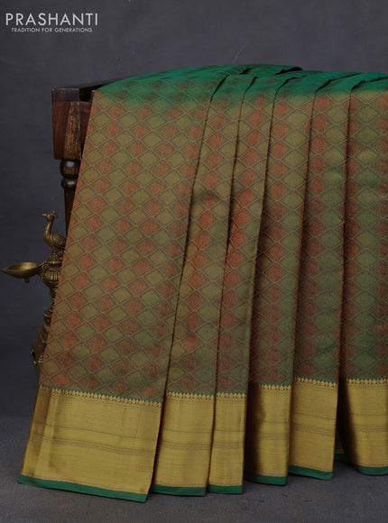 Pure kanchipuram silk saree dual shade of greenish maroon with allover self emboss & zari weaves and zari woven border