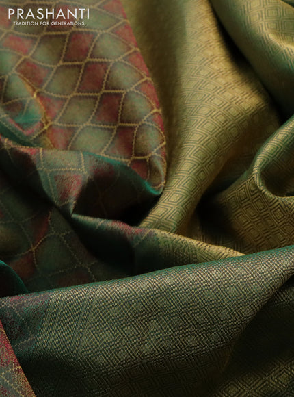Pure kanchipuram silk saree dual shade of greenish maroon with allover self emboss & zari weaves and zari woven border