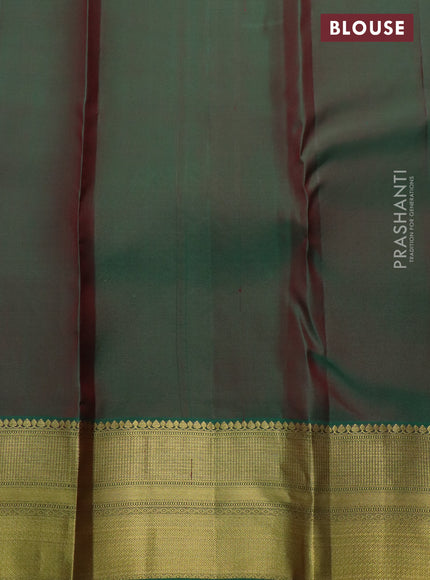 Pure kanchipuram silk saree dual shade of greenish maroon with allover self emboss & zari weaves and zari woven border