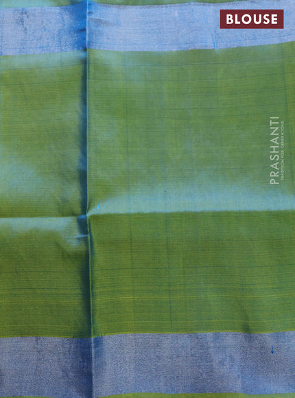 Pure uppada silk saree cs blue and dual shade of lime green with allover silver zari woven floral buttas and long silver zari woven paisley butta border