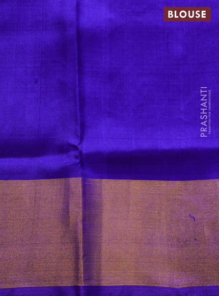Pure uppada silk saree dual shade of bluish green and violet with allover silver zari woven buttas and long paisley design zari woven border