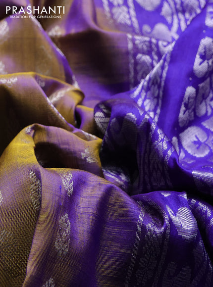 Pure uppada silk saree dual shade of mustard and blue with allover silver zari woven buttas and long silver zari woven border