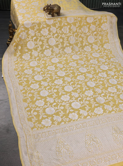 Banarasi georgette saree pale yellow with allover thread & zari woven floral weaves and woven border