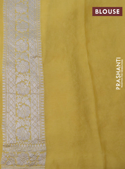 Banarasi georgette saree pale yellow with allover thread & zari woven floral weaves and woven border