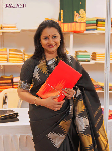 Pure kanchipuram silk saree black with plain body and temple design zari woven border