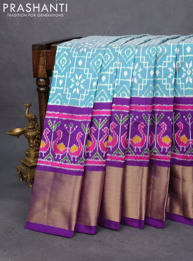 Pochampally silk saree teal blue and violet with allover ikat weaves and long ikat woven zari border