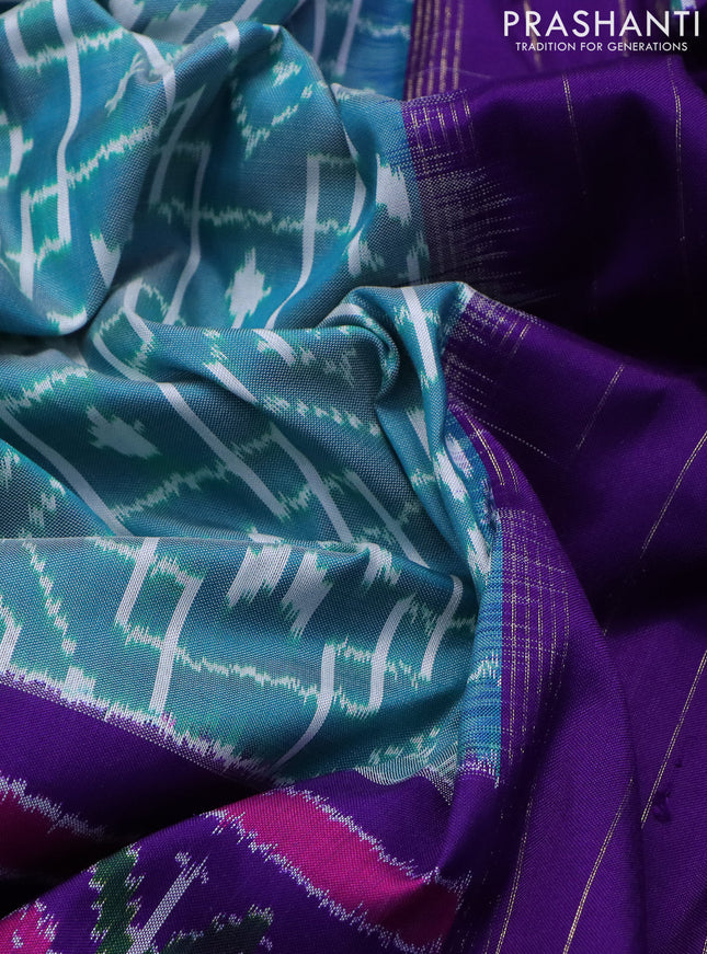 Pochampally silk saree teal blue and violet with allover ikat weaves and long ikat woven zari border