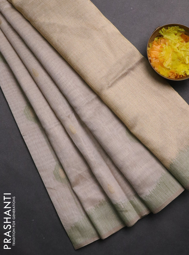 Munga cotton saree beige and light green with thread & zari weaves and thread woven border