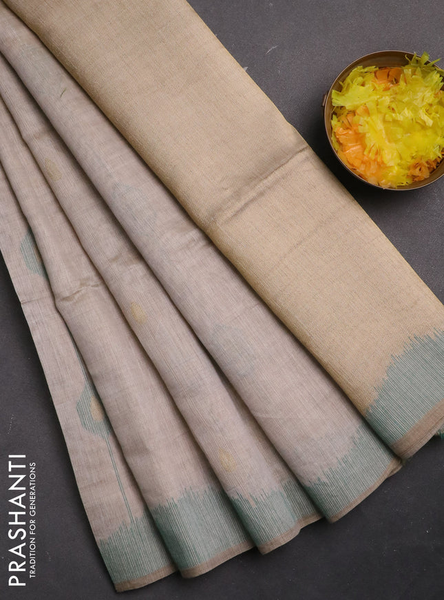 Munga cotton saree beige and green with thread & zari weaves and thread woven border