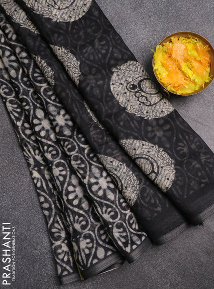 Semi linen saree black with allover prints and zari woven piping border