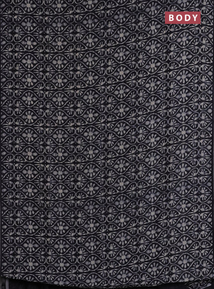 Semi linen saree black with allover prints and zari woven piping border