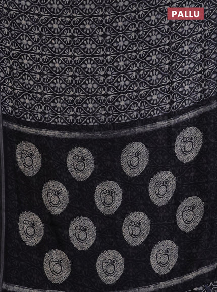 Semi linen saree black with allover prints and zari woven piping border