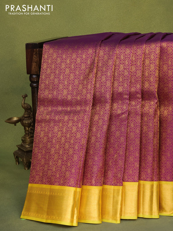 Pure kanchipuram silk saree purple and lime yellow with allover zari woven brocade weaves and zari woven korvai border