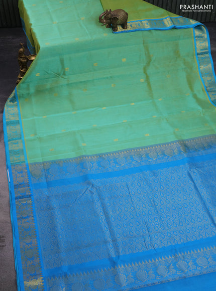 10 yards silk cotton saree dual shade of teal green and cs blue with zari woven buttas and annam zari woven border