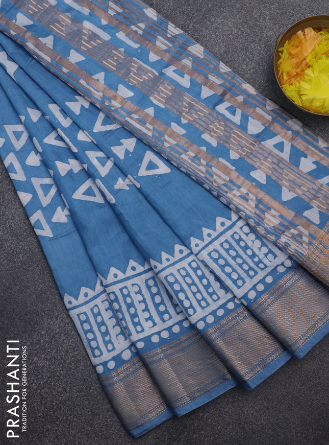 Semi chanderi saree blue and off white with batik prints and zari woven border