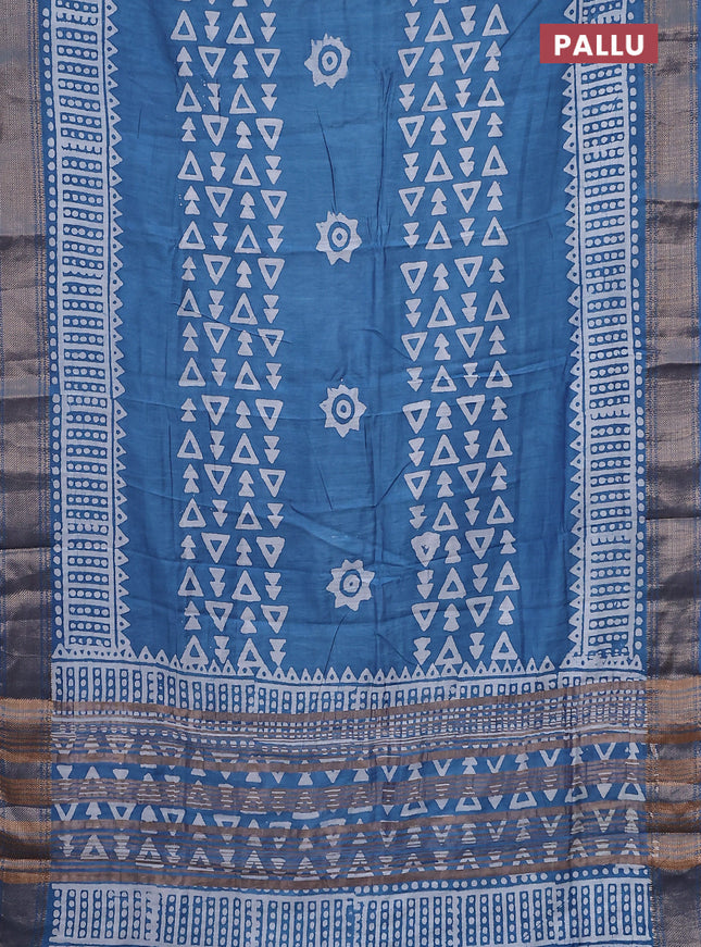 Semi chanderi saree blue and off white with batik prints and zari woven border