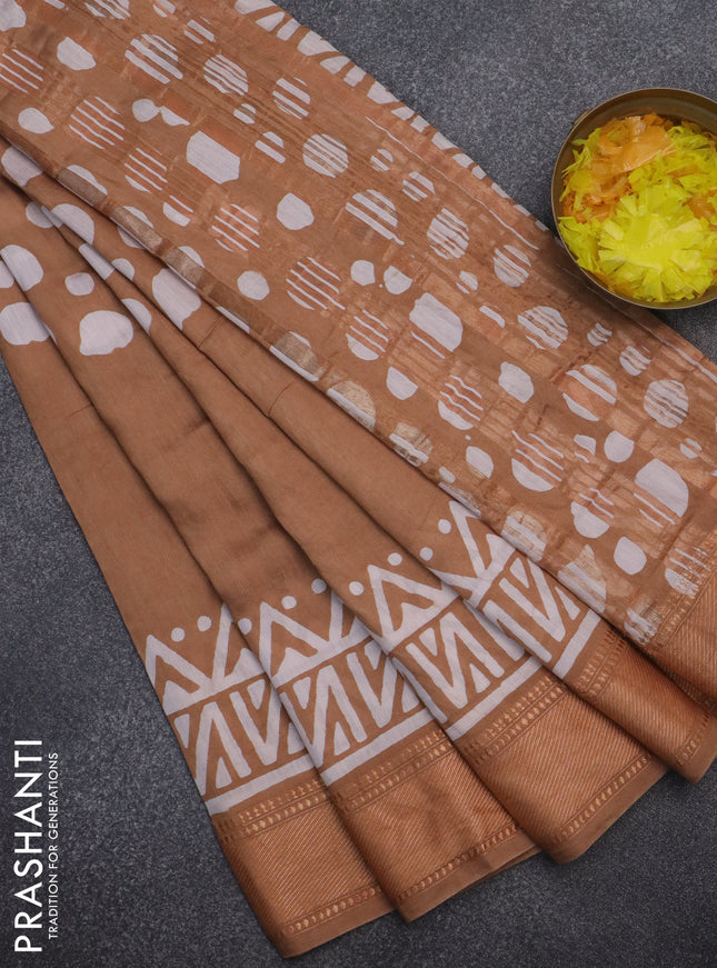 Semi chanderi saree dark sandal and off white with batik prints and zari woven border