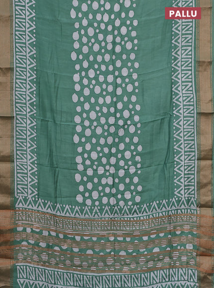 Semi chanderi saree pastel green and off white with batik prints and zari woven border