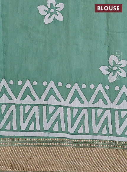 Semi chanderi saree pastel green and off white with batik prints and zari woven border