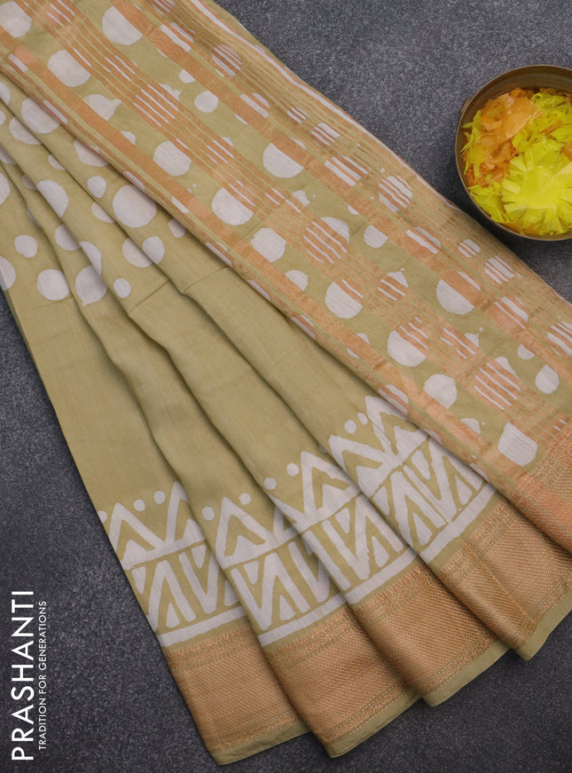 Semi chanderi saree sandal and off white with batik prints and zari woven border