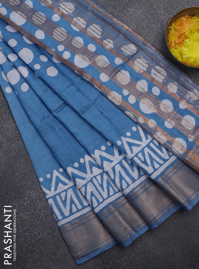 Semi chanderi saree blue and off white with batik prints and zari woven border