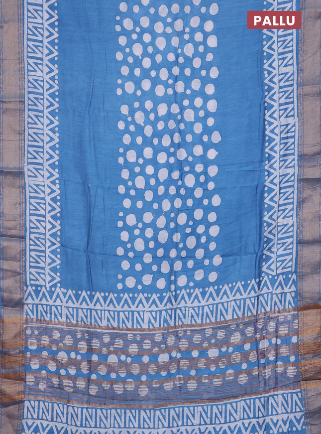 Semi chanderi saree blue and off white with batik prints and zari woven border