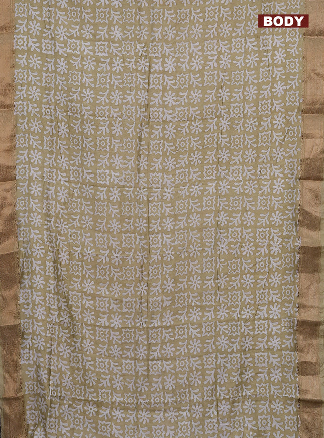 Semi chanderi saree sandal and off white with allover batik prints and zari woven border