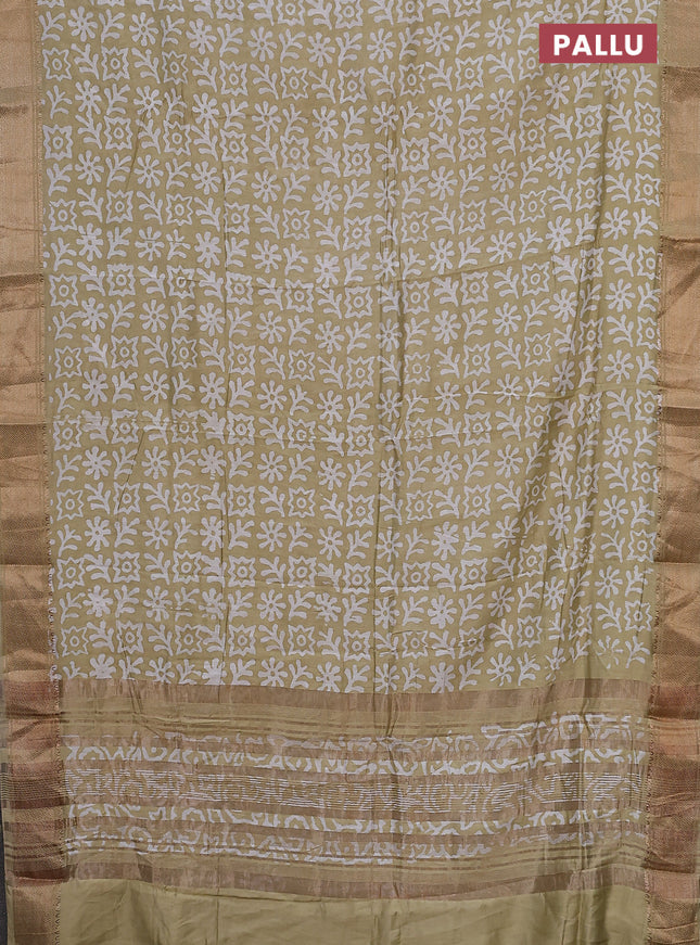 Semi chanderi saree sandal and off white with allover batik prints and zari woven border