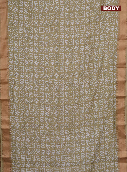 Semi chanderi saree sandal and off white with allover batik prints and zari woven border