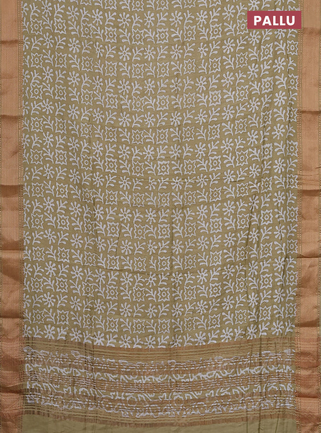 Semi chanderi saree sandal and off white with allover batik prints and zari woven border