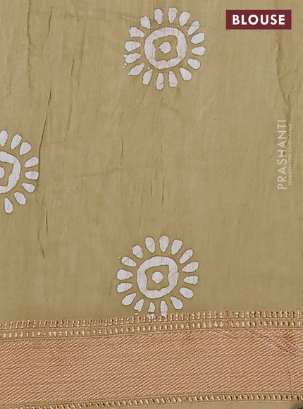 Semi chanderi saree sandal and off white with allover batik prints and zari woven border