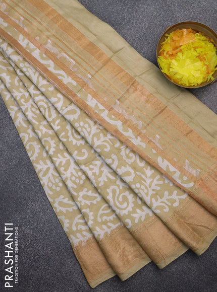 Semi chanderi saree sandal and off white with allover batik prints and zari woven border