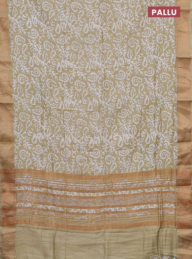 Semi chanderi saree sandal and off white with allover batik prints and zari woven border