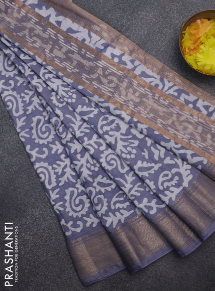 Semi chanderi saree grey and off white with allover batik prints and zari woven border