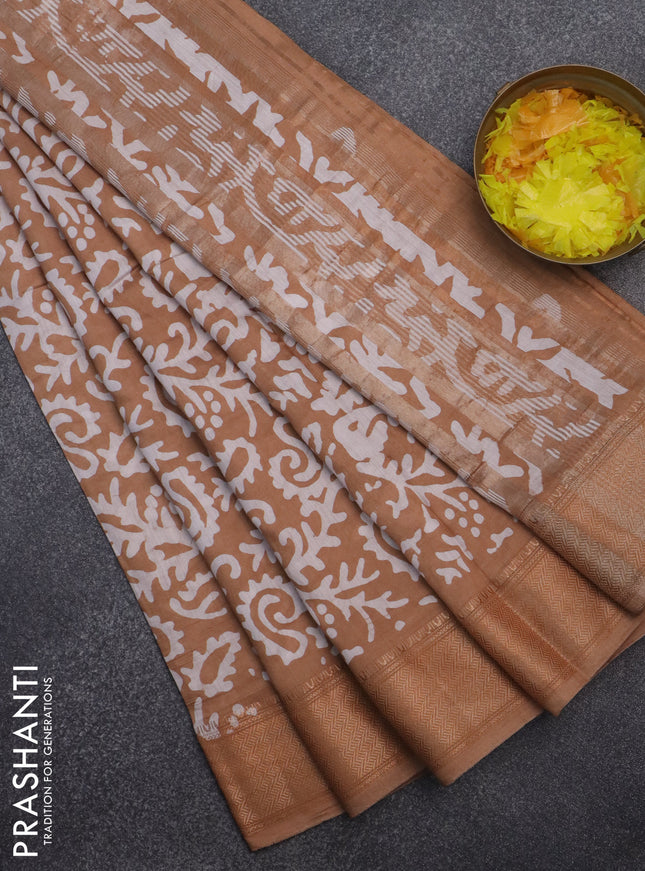 Semi chanderi saree dark sandal and off white with allover batik prints and zari woven border
