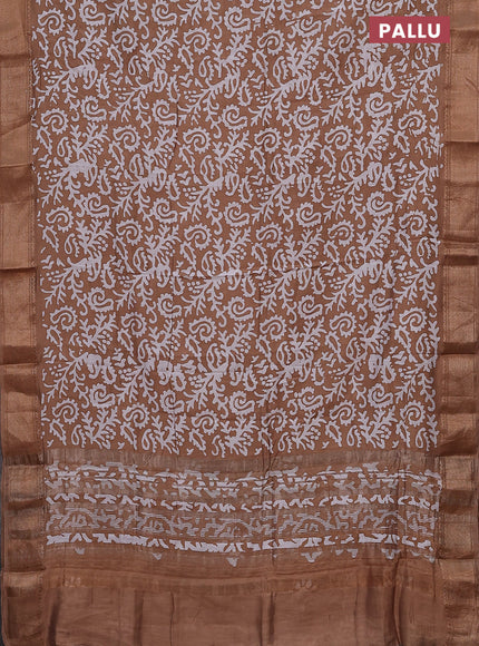 Semi chanderi saree dark sandal and off white with allover batik prints and zari woven border