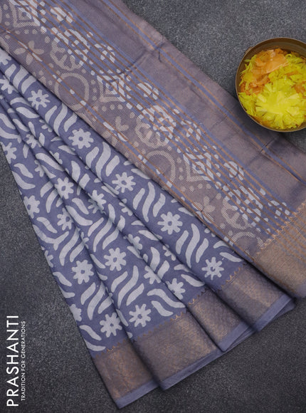 Semi chanderi saree grey and off white with allover batik prints and zari woven border