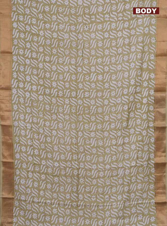 Semi chanderi saree sandal and off white with allover batik prints and zari woven border