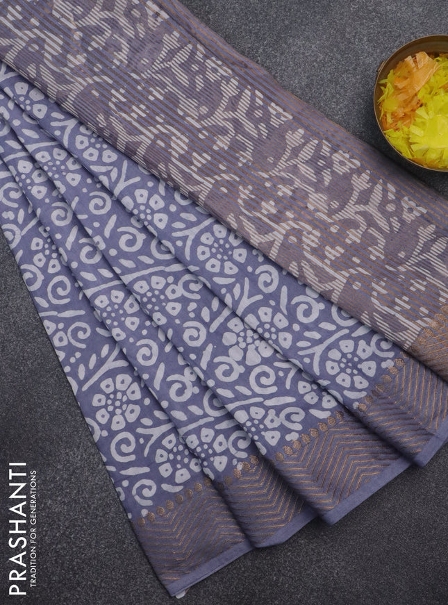 Semi chanderi saree grey and off white with allover batik prints and zari woven border