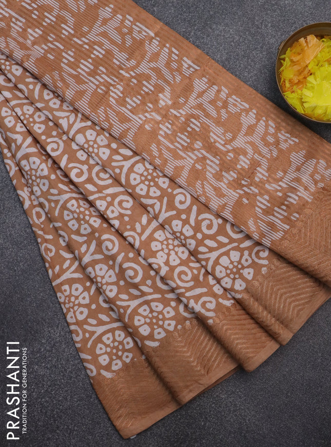 Semi chanderi saree dark sandal and off white with allover batik prints and zari woven border