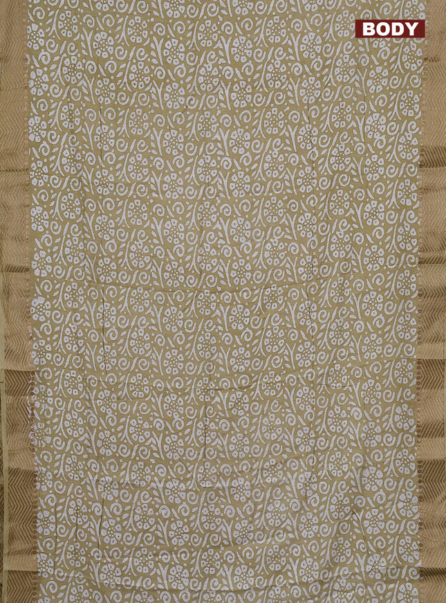 Semi chanderi saree sandal and off white with allover batik prints and zari woven border