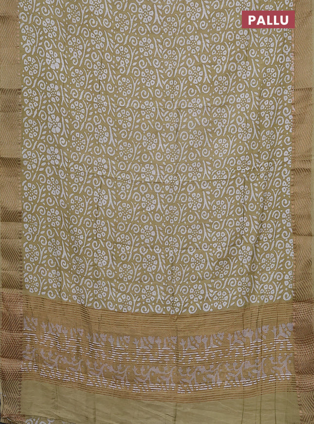 Semi chanderi saree sandal and off white with allover batik prints and zari woven border