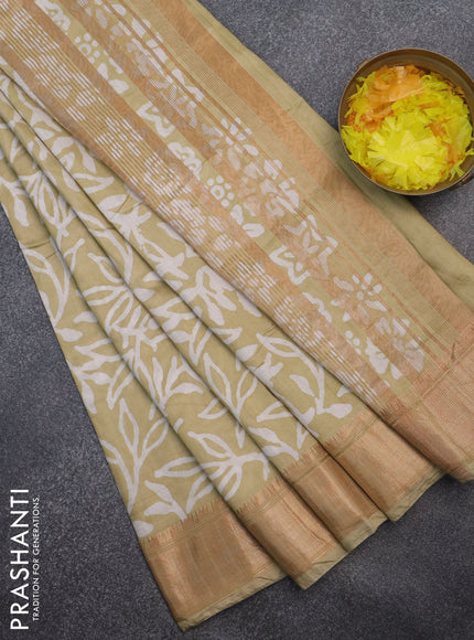 Semi chanderi saree sandal and off white with allover batik prints and zari woven border