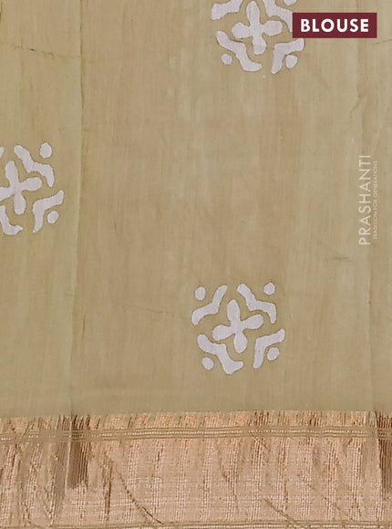 Semi chanderi saree sandal and off white with allover batik prints and zari woven border