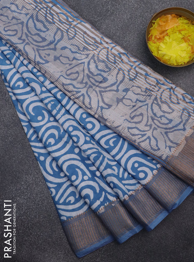 Semi chanderi saree blue and off white with allover batik prints and zari woven border