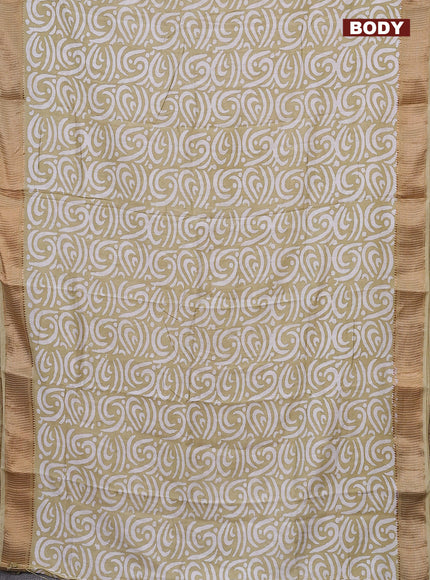 Semi chanderi saree sandal and off white with allover batik prints and zari woven border