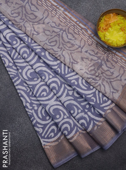 Semi chanderi saree grey and off white with allover batik prints and zari woven border