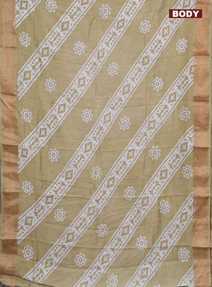 Semi chanderi saree sandal and off white with allover batik prints and zari woven border