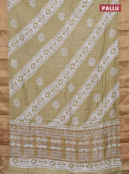 Semi chanderi saree sandal and off white with allover batik prints and zari woven border