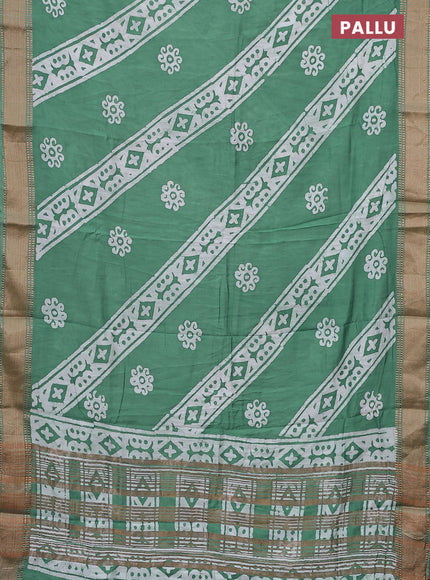 Semi chanderi saree pastel green and off white with allover batik prints and zari woven border